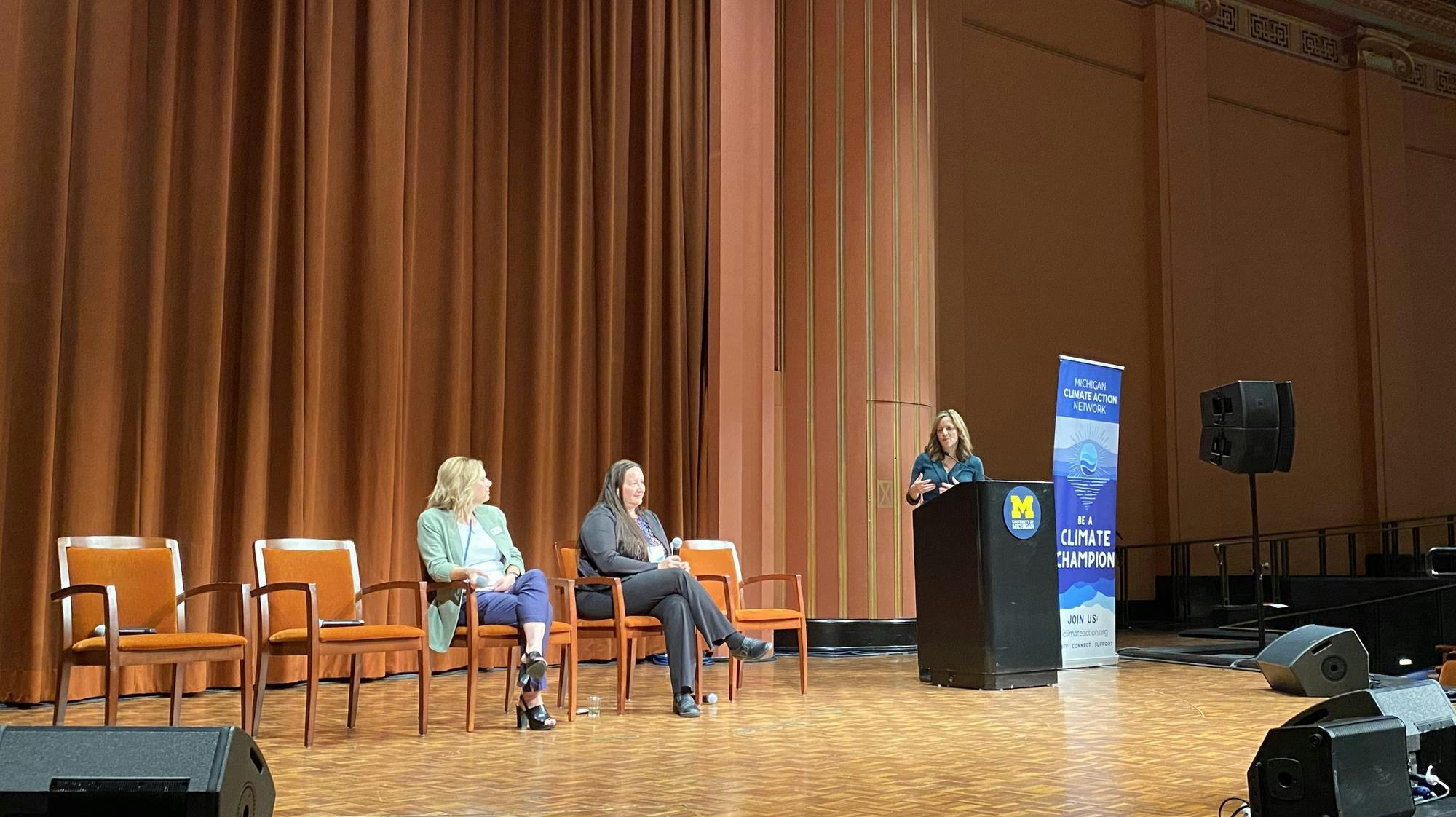 Jackie Beaudry, Melanie Ryska and Jocelyn Benson discuss early voting and trusting democracy during their panel at the Michigan Climate Summit. 