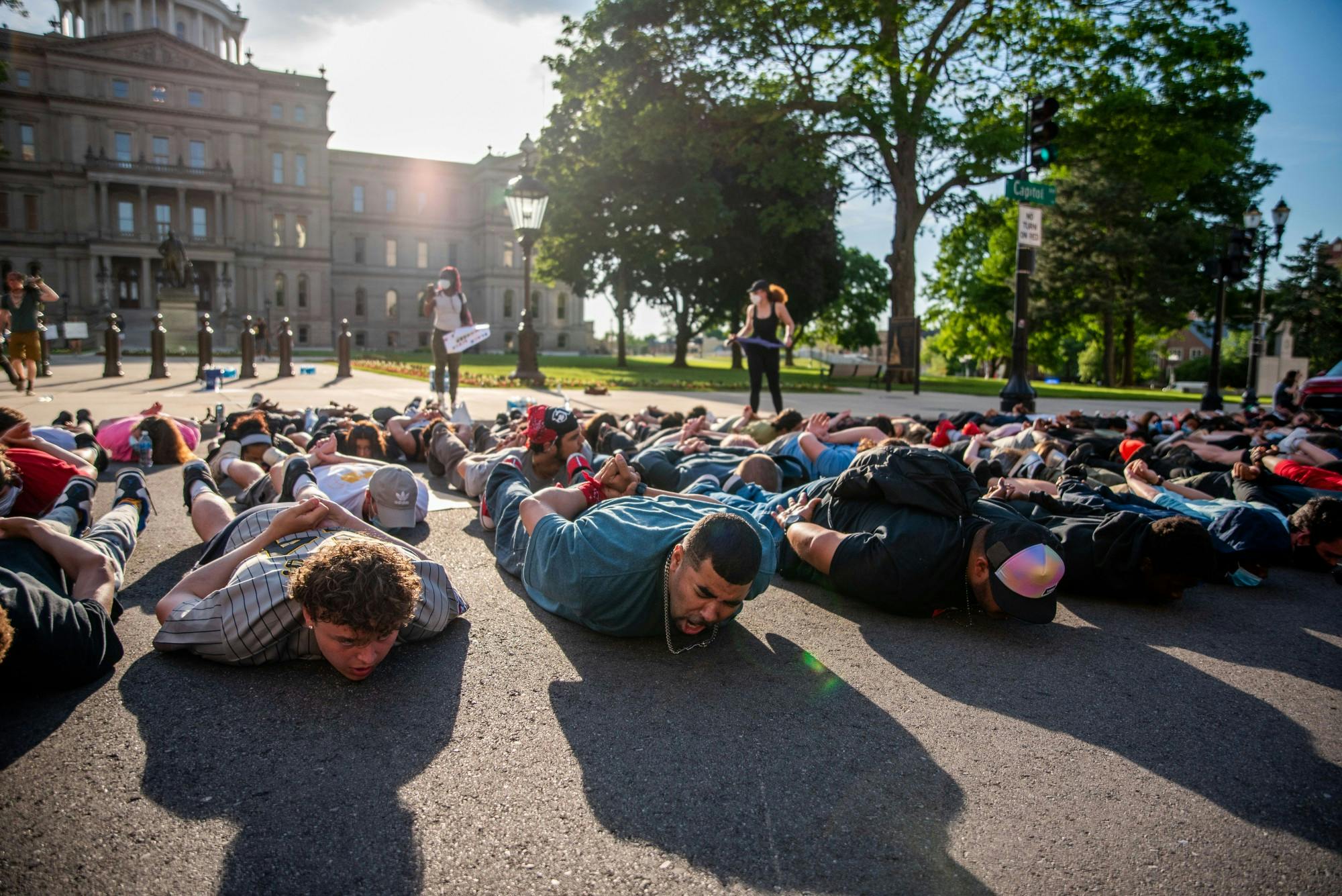 <p>Protesters lie in the street in front of the Capitol as they chant &quot;I can&#x27;t breathe&quot; on June 3, 2020.</p>