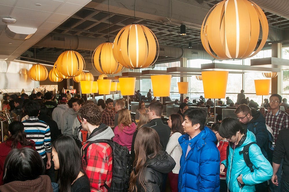 	<p>Students stand in line Feb. 13, 2014, at The Vista at Shaw. The Vista at Shaw is one of the many cafeterias experiencing overcrowding on campus. Danyelle Morrow/The State News</p>
