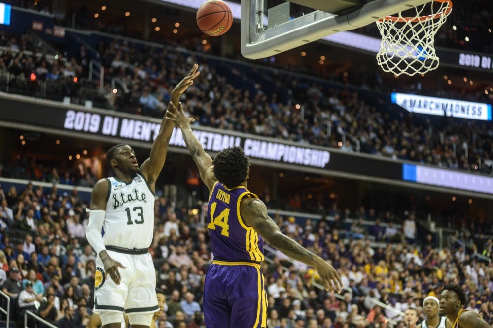 Freshman forward Gabe Brown (13) shoots the ball during the game against LSU at Capital One Arena on March 29, 2019. The Spartans defeated the Tigers, 80-63.