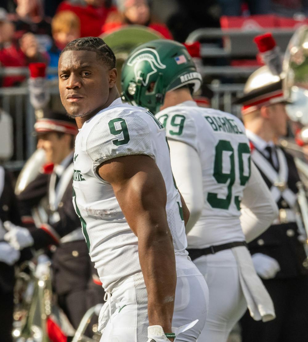 Michigan State running back Kenneth Walker III (9) turns towards the crowd during Michigan State's loss to Ohio State on Nov. 20, 2021.