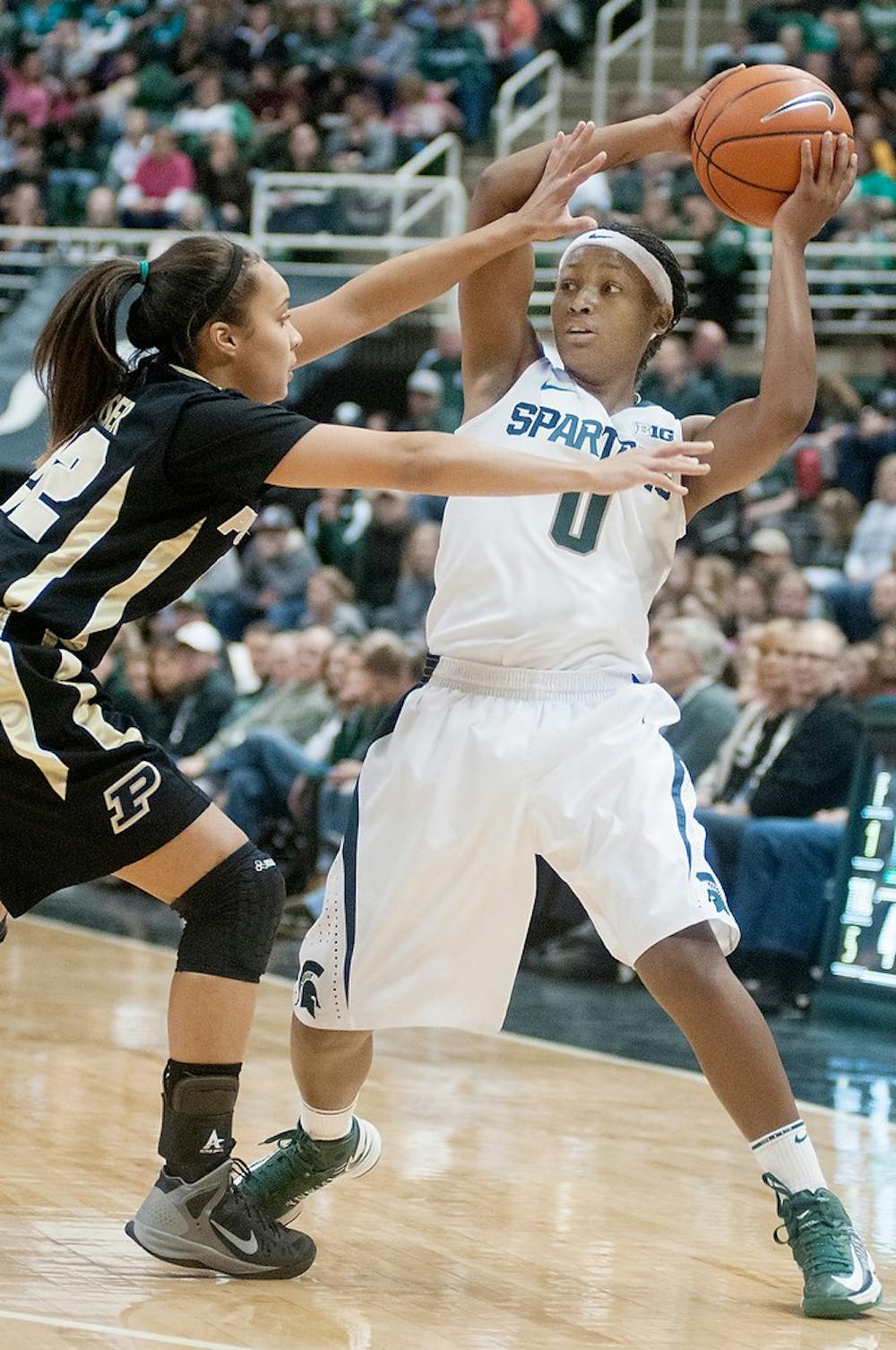 	<p>Purdue guard K.K. Houser tries to block sophomore guard Kiana Johnson on Jan. 27, 2013, at Breslin Center. The Spartans lost, 67-62. Julia Nagy/The State News</p>
