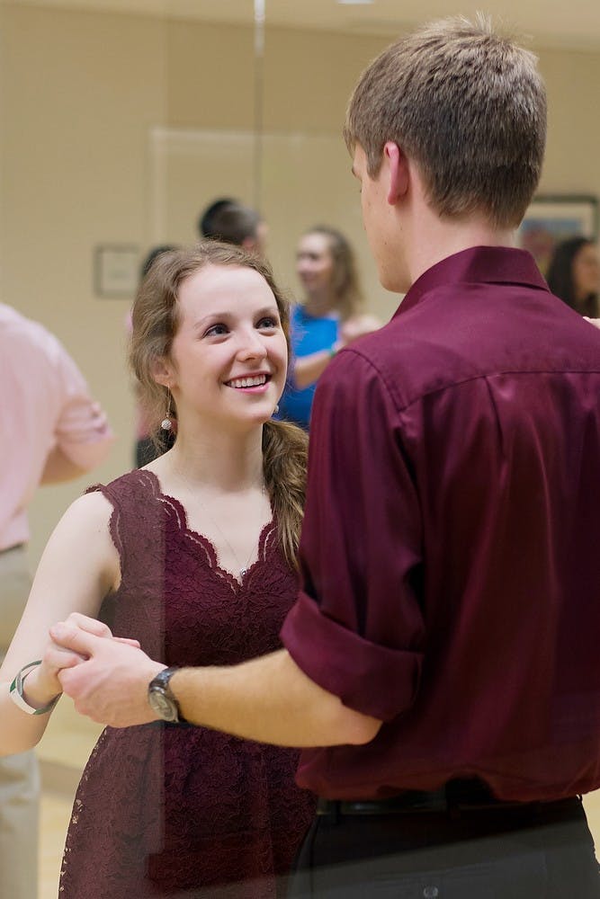 	<p>Music and Spanish sophomore Sarah Brzysk and music education sophomore Andrew Allmon dance at the Union Ballroom on Jan. 17, 2014. First time ballroom dancers, both agreed that swing dancing was the most fun out of the three styles they learned. Casey Hull/The State News</p>