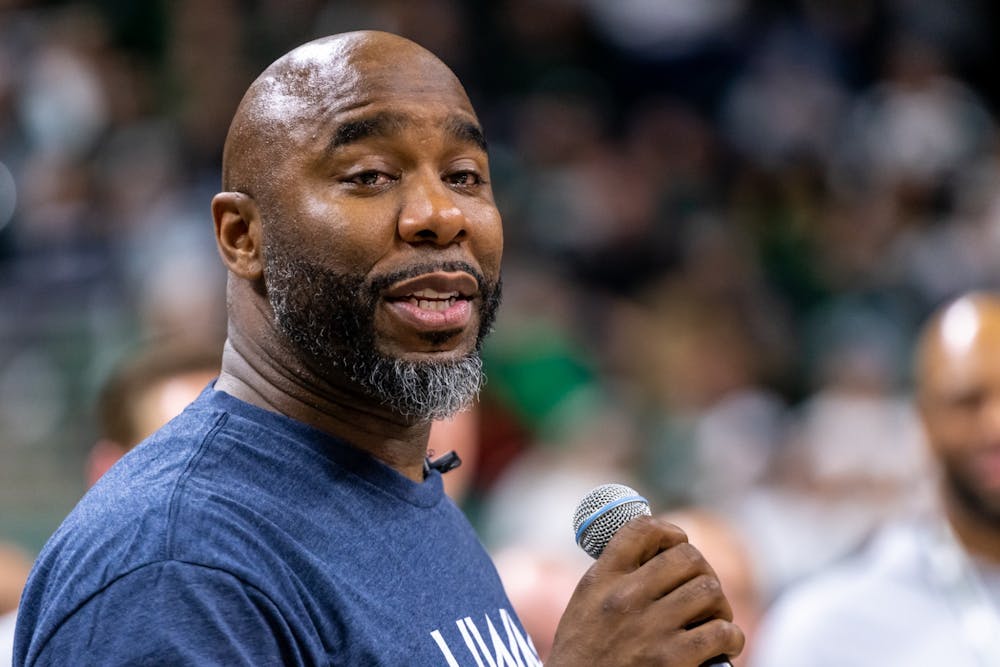 <p>NCAA basketball and former MSU basketball player Mateen Cleaves gives a speech with tears in his eyes as the 2000 Spartan basketball team is honored at halftime during a game between MSU and Maryland. The Spartans fell to the Terrapins, 60-67, at the Breslin Student Events Center on Feb. 15, 2020. </p>