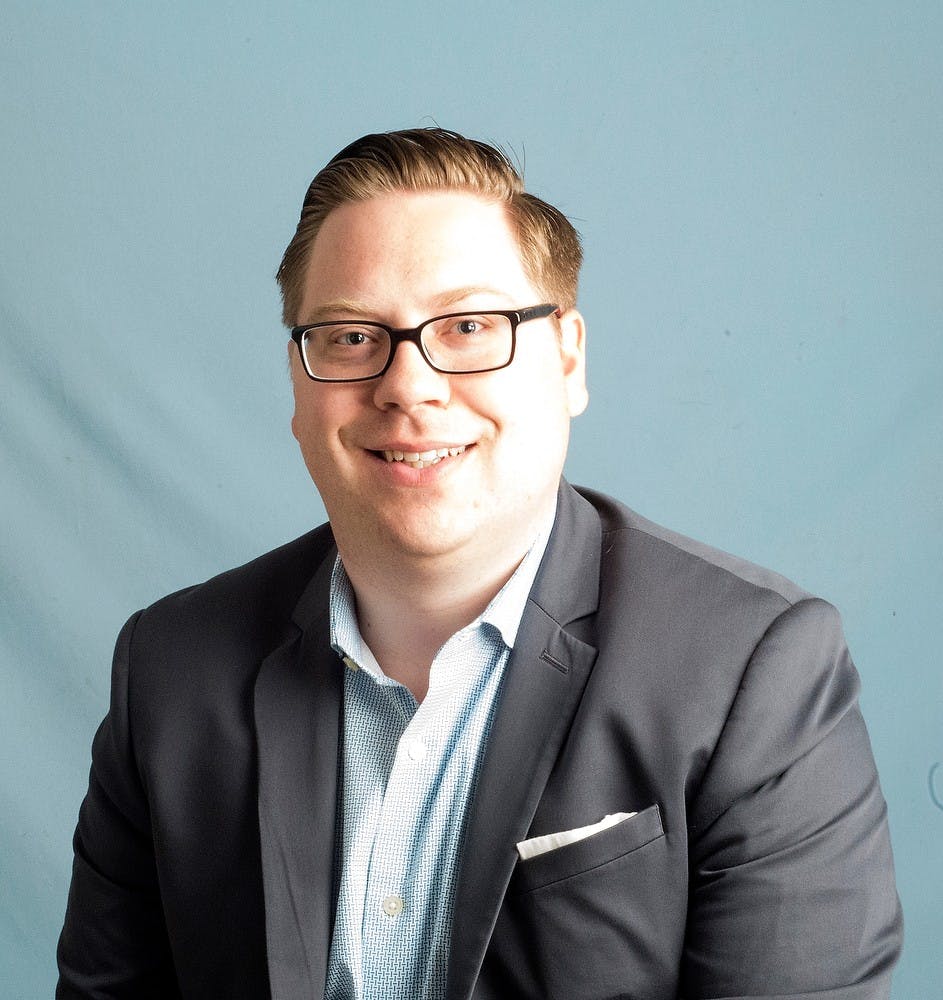 <p>City council candidate Steve Ross poses for a picture April 9, 2015, at the State News on East Grand River Avenue. The election will take place this November. Hannah Levy/The State News</p>