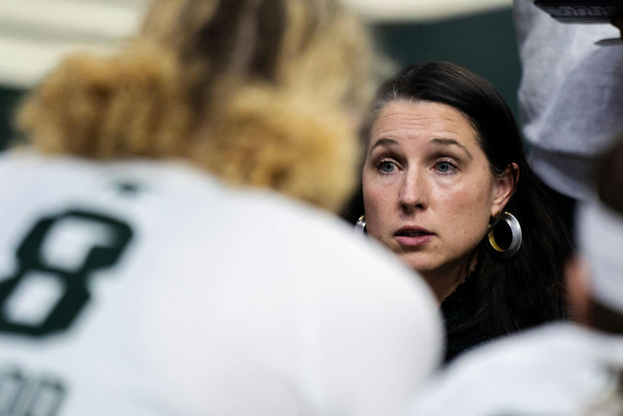 <p>Michigan State head volleyball coach Leah Johnson addresses her players during a time out against the University of Michigan at the Breslin Center on Nov. 15, 2024.</p>