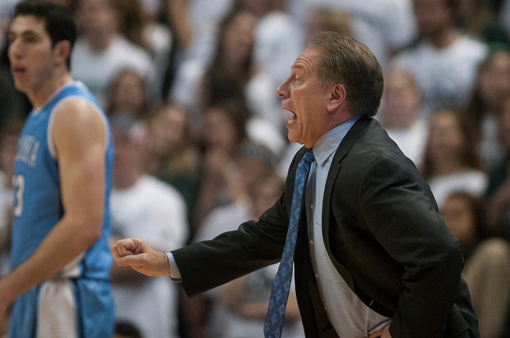 	<p>Men&#8217;s basketball head coach Tom Izzo yells at players from the bench during the game against Columbia on Nov. 15, 2013, at Breslin Center. The Spartans beat the Lions, 53-62. Danyelle Morrow/The State News</p>
