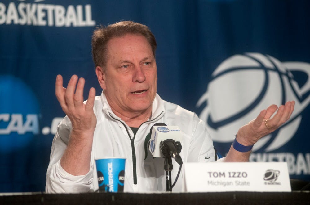 <p>Head coach Tom Izzo responds to questions from the media on March 21, 2014, at Spokane Veterans Memorial Arena in regards to their upcoming game against Harvard on Saturday. Izzo commented on his relationship with Harvard head coach Tommy Amaker, Payne's performance in Thursday's game, and his reaction to how Harvard plays. Betsy Agosta/The State News</p>