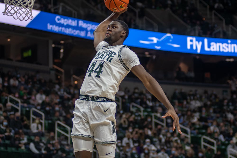 <p>Senior forward Gabe Brown (44) goes up for a dunk against Eastern Michigan at the Breslin Center in East Lansing on Nov. 20, 2021.</p>