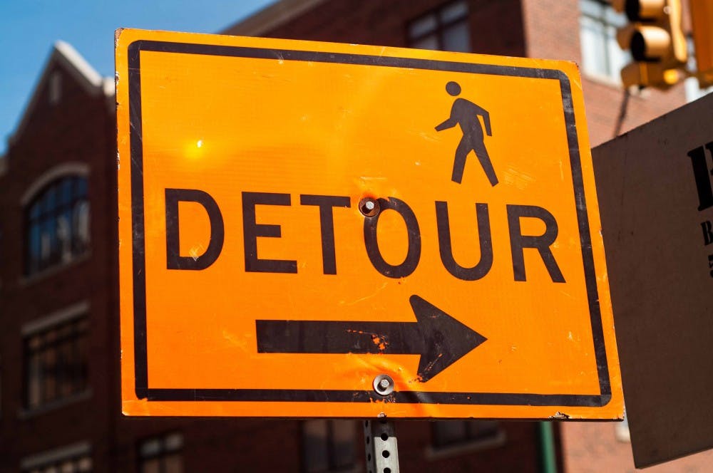 <p>Construction and detours continue on Albert Avenue and on the corner of Abbot Road May 23, 2018. (Annie Barker | State News)</p>