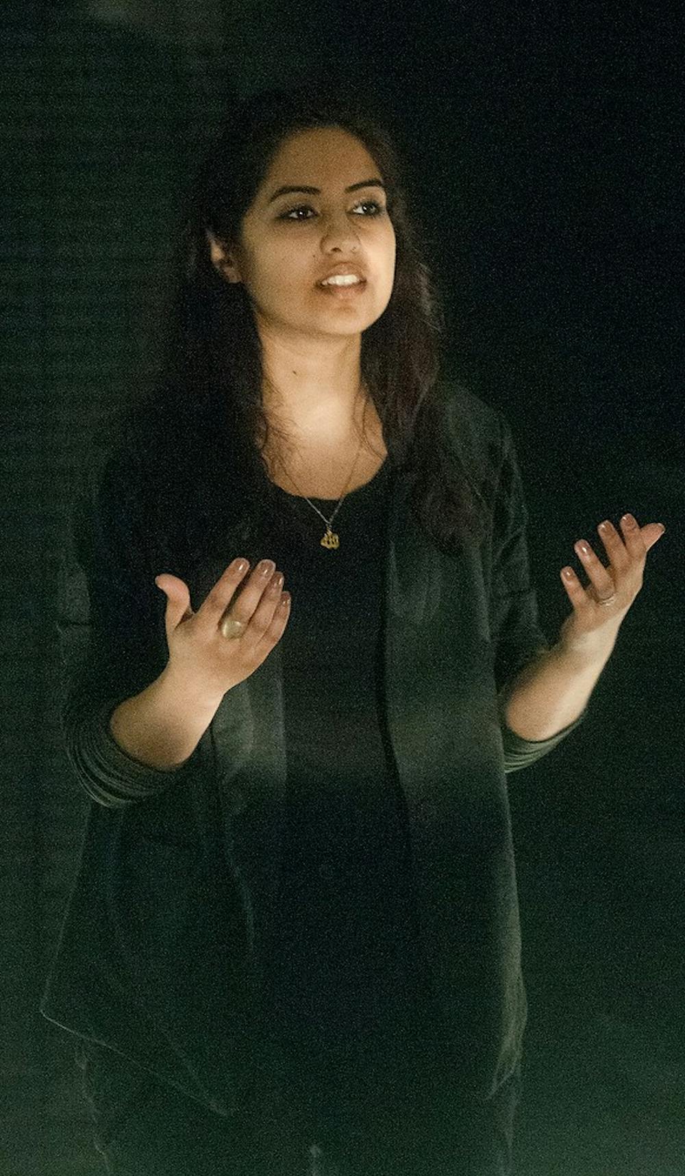 <p>Fatima-Iram Din delivers a monologue March 31, 2015 at The Union on 49 Abbott Rd. The show consisted of several monologues detailing individual stories of oppression. Alice Kole/The State News </p>