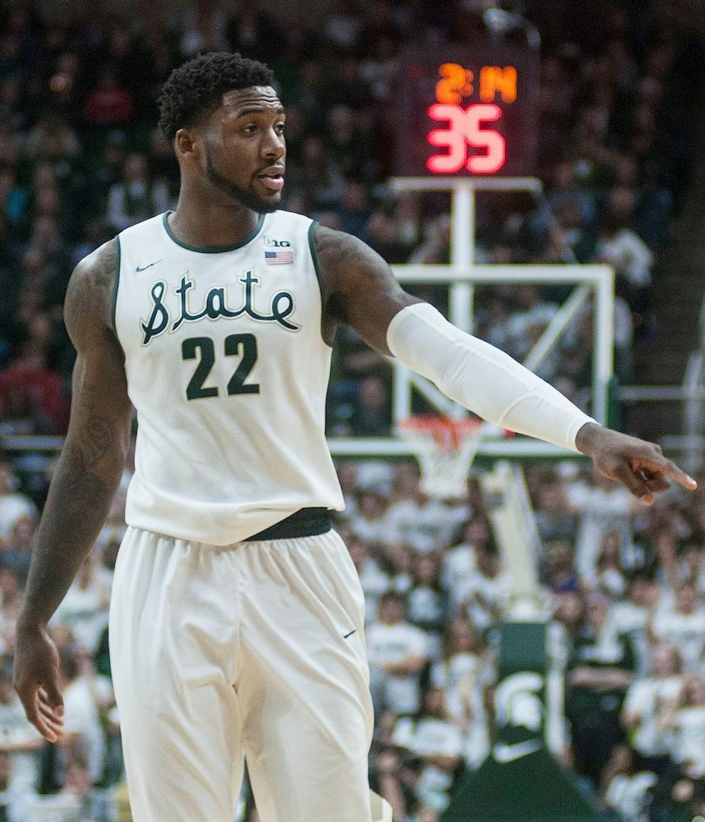 <p>Senior guard/forward Branden Dawson signals to his teammates Feb. 14, 2015, during the game against Ohio State at Breslin Center. The Spartans defeated by the Buckeyes, 59-56. Hannah Levy/The State News</p>