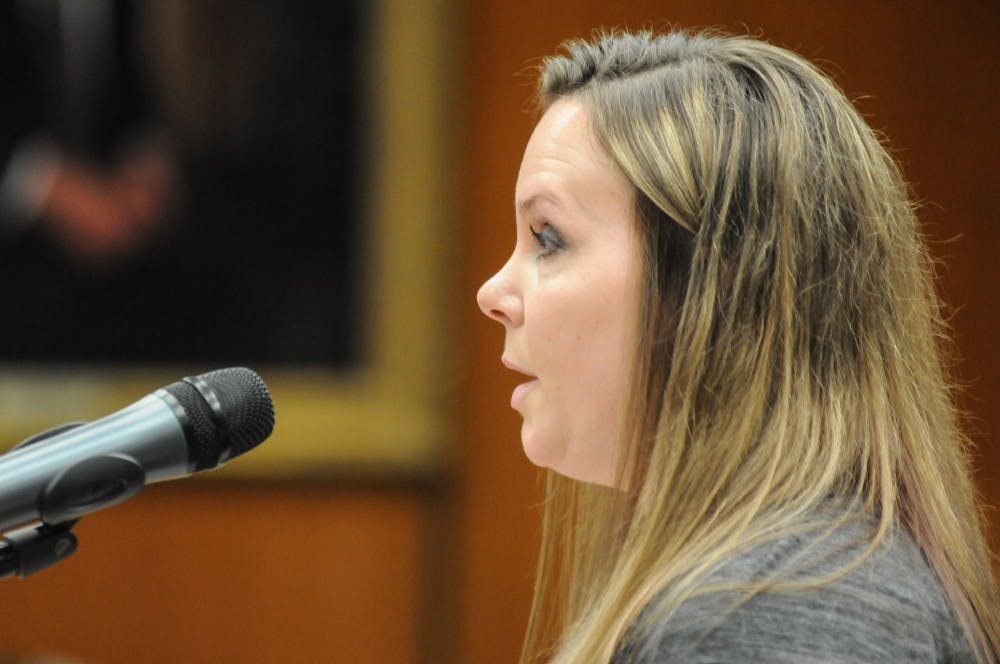 Survivor Nicole Casady speaks at the Board of Trustees meeting on April 12, 2019 at the Administration Building.