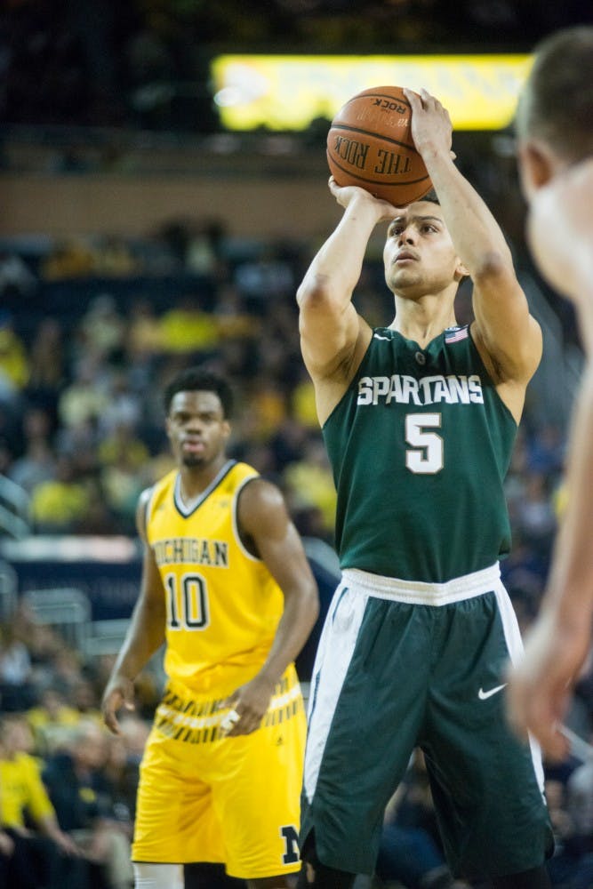 Senior guard Bryn Forbes shoots a free throw during the game against Michigan at Crisler Center in Ann Arbor on Feb. 6, 2016.  The Spartans defeated the Wolverines 89-73.