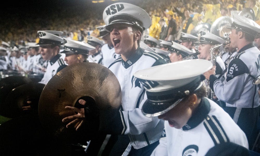 The Spartan Marching Band cheers during the game against University of Michigan on Oct. 7, 2017, at Michigan Stadium. The Spartans defeated the Wolverines 14-10.