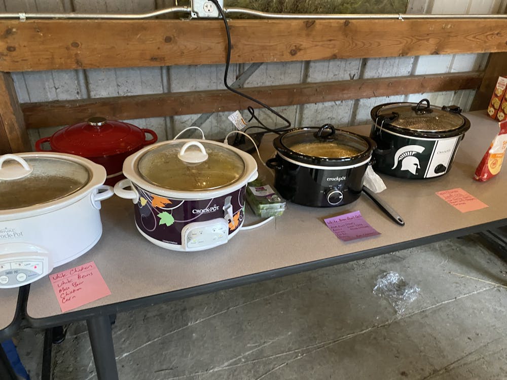 <p>Participants’ chili pots line up amongst one another waiting to be eaten at the MSU Fisheries and Wildlife Cookoff on March 31, 2023. </p>