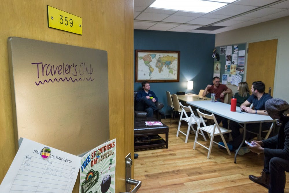 Members socialize before the MSU Traveler's Club meeting begins on March 31, 2017 at Olin Health Center. The MSU Traveler's Club is a club that provides a social space and support for people who are in recovery from addiction. 