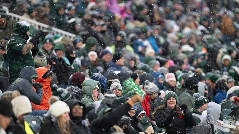 <p>Spartan fans follow the game against the Rutgers in cold weather at Spartan Stadium on Nov. 30, 2024.</p>