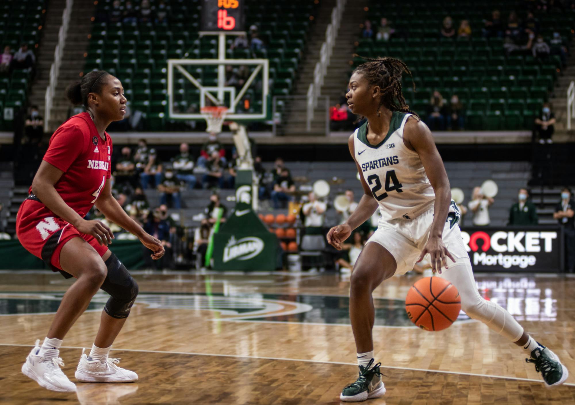 <p>Clouden (24) brings the ball in against the Nebraska Cornhuskers at the Breslin on Thursday, Dec. 30, 2021.</p>