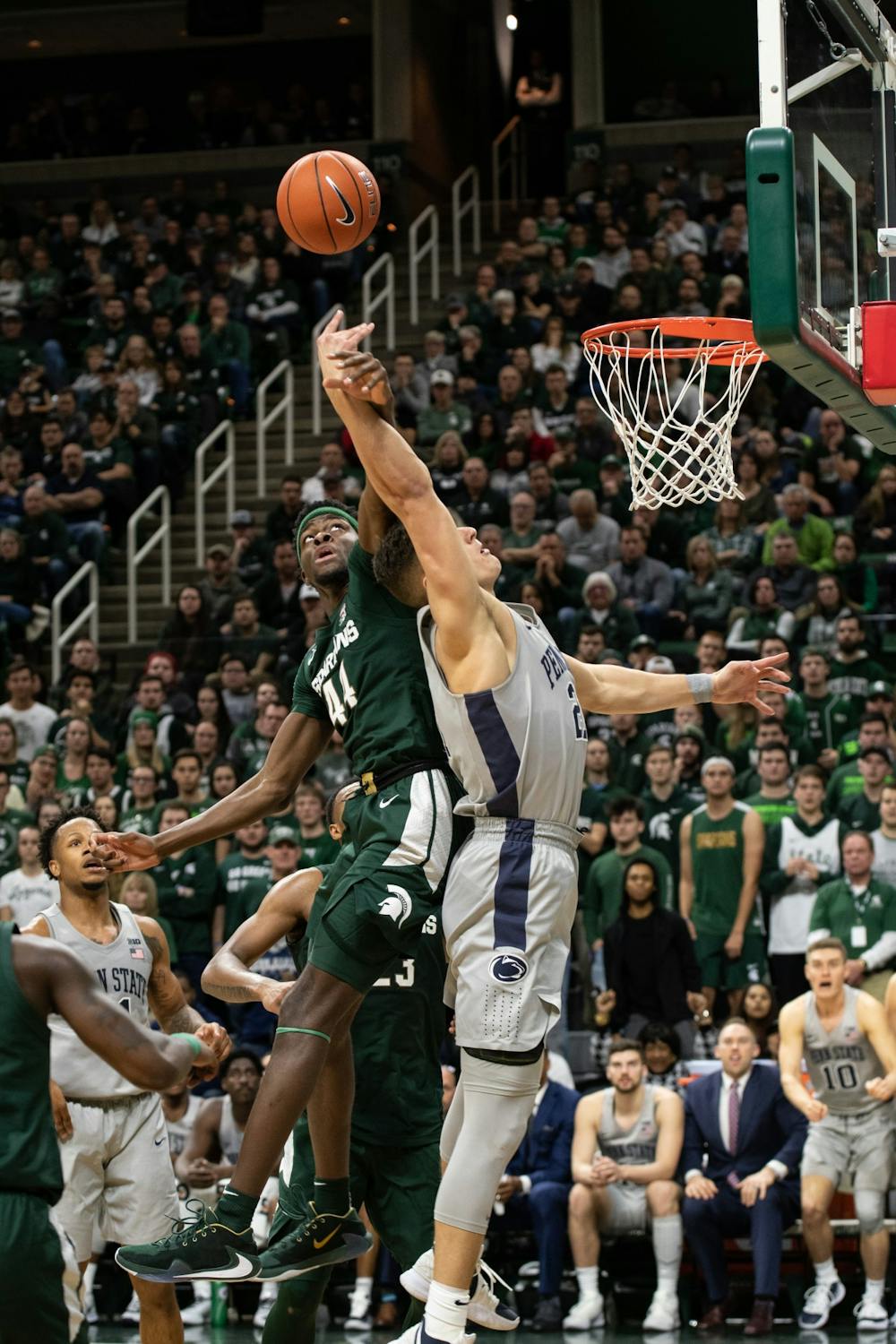 MSU forward Gabe Brown (44) fights for possession of the ball during a basketball game against Penn State at the Breslin Center on Feb. 4, 2020. The Spartans fell to the Nittany Lions, 70-75.