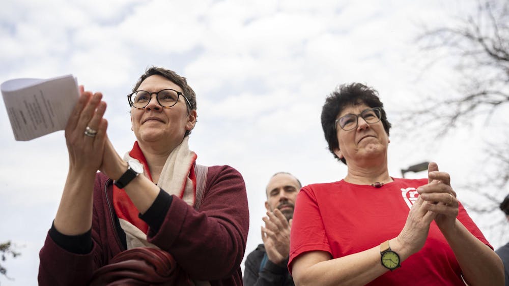 Supporters applaud a speaker during the Stand Up for Higher Education Rally outside the Hannah Administration Building on April 17, 2025.