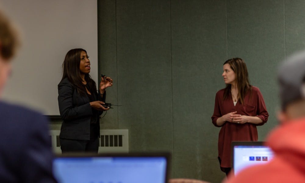 <p>MSU trustees Brianna Scott (left) and Kelly Tebay speaking with members of ASMSU on Feb. 28, 2019.</p>