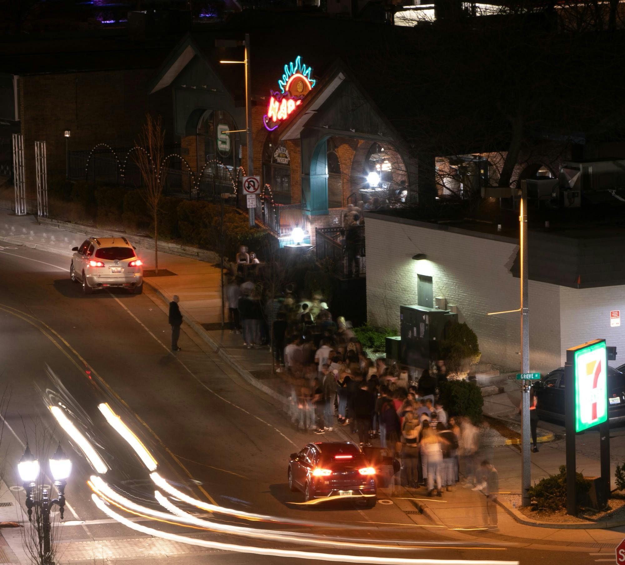 A line of people wait outside Harper's after MSU cancelled classes due to coronavirus March 11, 2020.