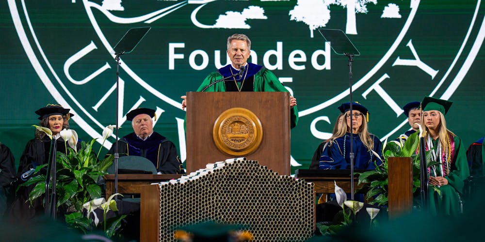 <p>Michigan State's president, Kevin Guskiewicz, gives a speech to the class of 2026 during a convocation inside the Breslin Center in East Lansing, Mich., on May 1, 2026.</p>