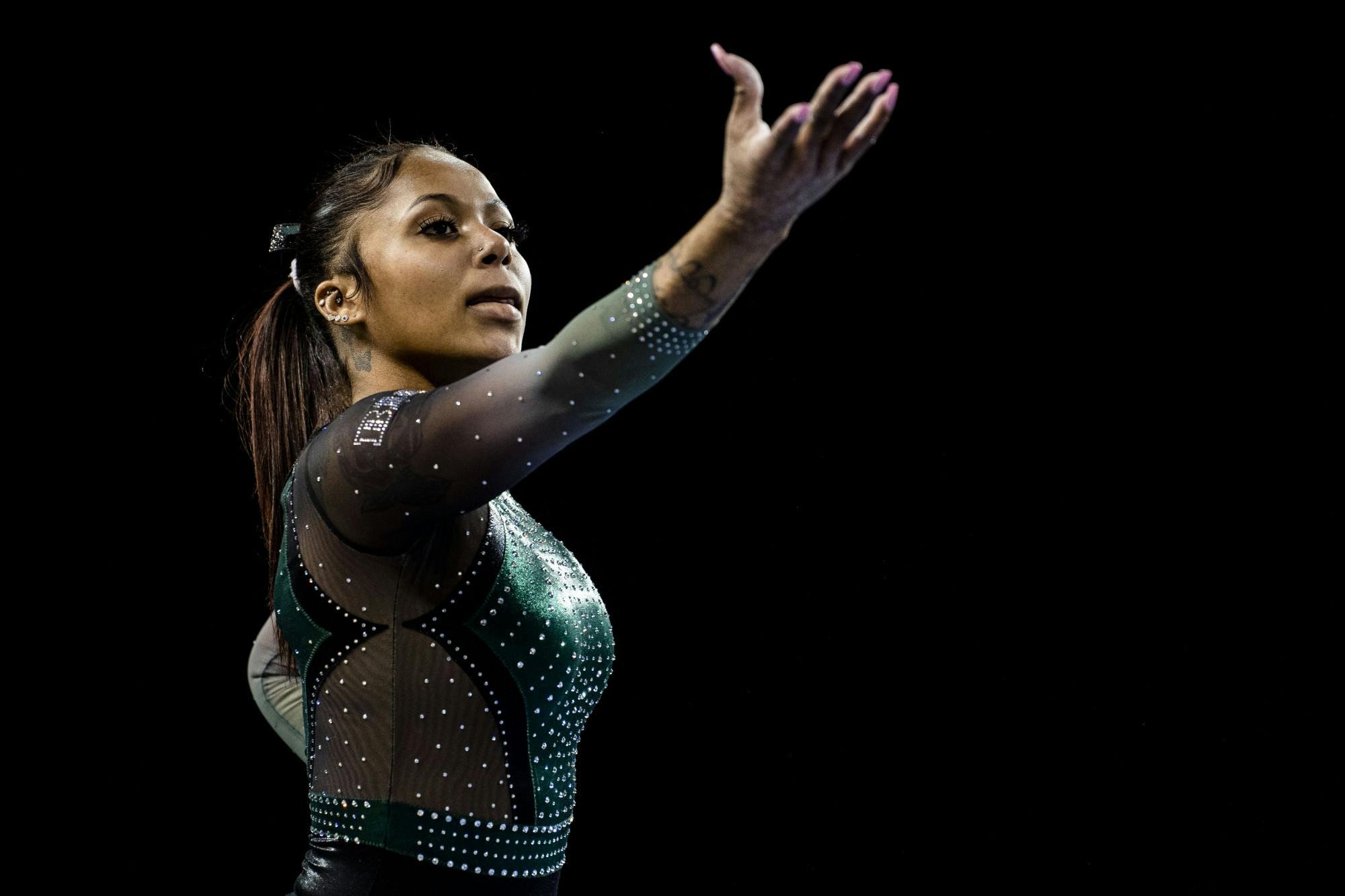 All-around junior Nyah Smith on the balance beam at the meet against Michigan on January 30, 2022, at the Crisler Center in Ann Arbor. The Spartans lost to the Wolverines 197.925 to 196.775.