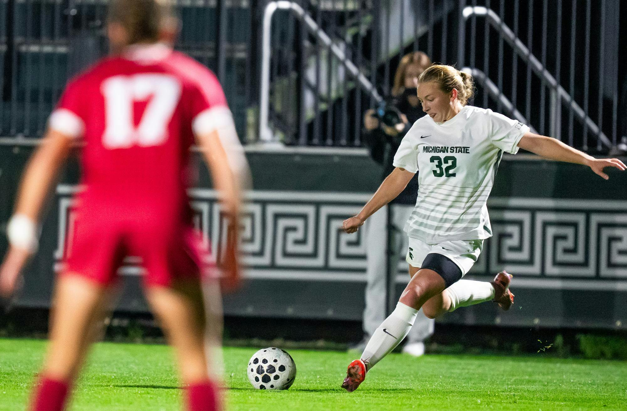 <p>Michigan State senior defender Maddie Illig (32) takes a shot towards Indiana University at DeMartin Soccer Stadium in East Lansing, Michigan on Thursday, Oct. 16, 2025.</p>
