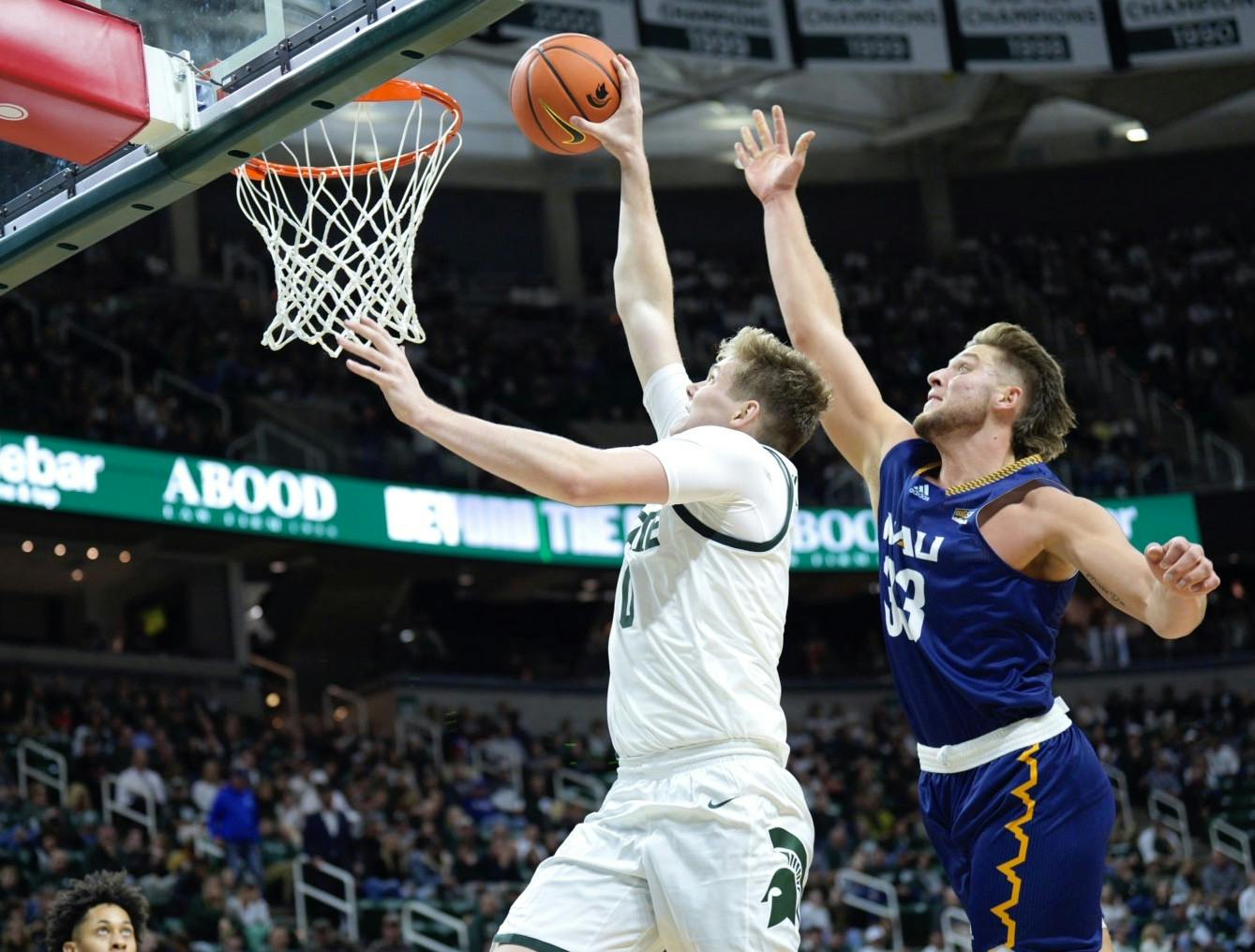 <p>Freshman forward Jaxon Kohler throws down a dunk. Michigan State defeated Northern Arizona 73-55 at the Breslin Center in the season opener of the 2022-23 season. </p>