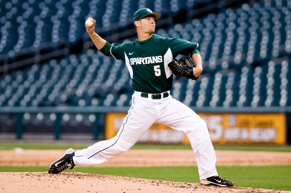 	<p>Sophomore pitcher Andrew Waszak throws a pitch Wednesday at Comerica Park in Detroit. Waszak allowed one run in seven innings to record his third win of the season in the Spartans&#8217; 3-1 victory over Central Michigan. Matt Radick/The State News</p>