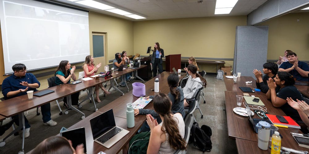 ASMSU Vice President for Finance and Operations, Anna Burk, recieves a round of applause after being reelected by the public to continue her role in the Student Affairs & Services building in East Lansing, MI on April 14, 2026.