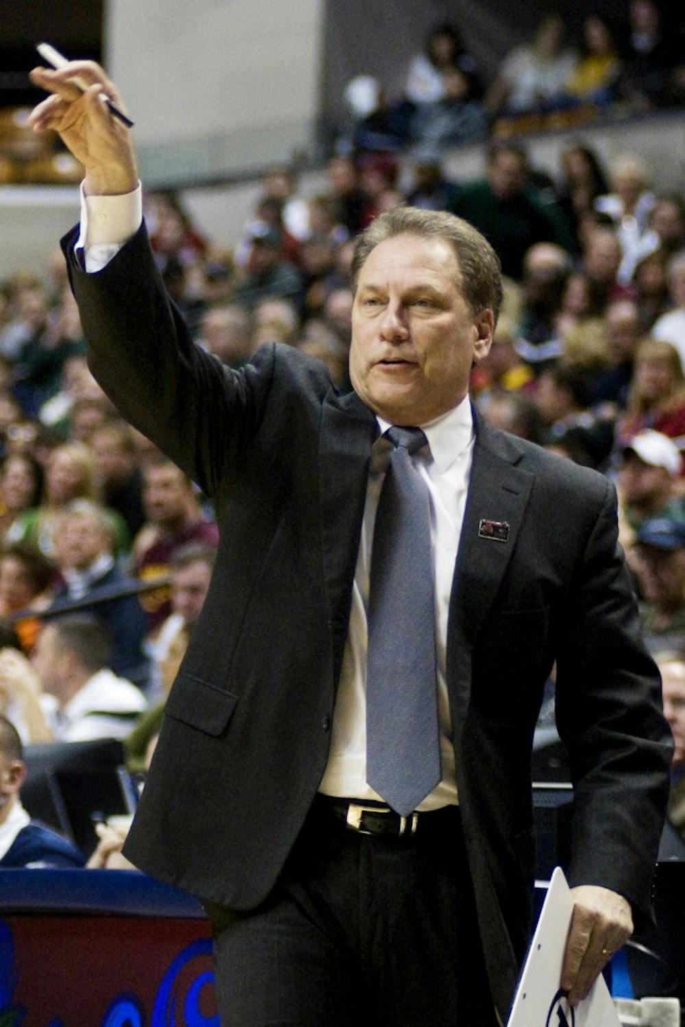 Head coach Tom Izzo calls out to his team Thursday at Conseco Fieldhouse in Indianapolis. The Spartans defeated the Iowa Hawkeyes, 66-61, in their first game in the 2011 Big Ten Tournament. Matt Radick/The State News