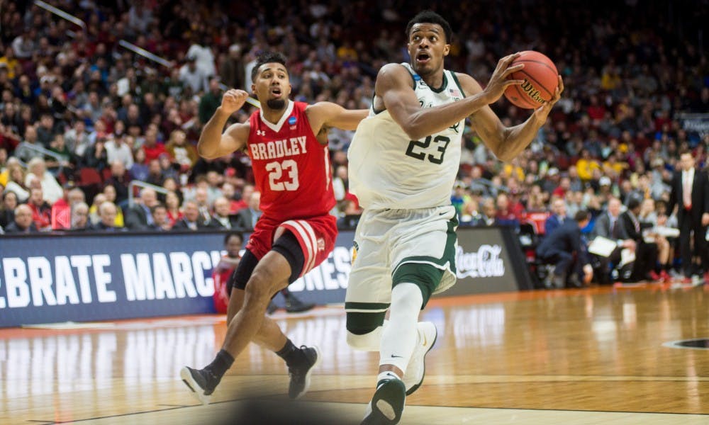 Sophomore forward Xavier Tillman (23) goes to shoot the ball after a Bradley turnover during the NCAA tournament game against Bradley at Wells Fargo Arena March 21, 2019. The Spartans defeated the Braves, 76-65.