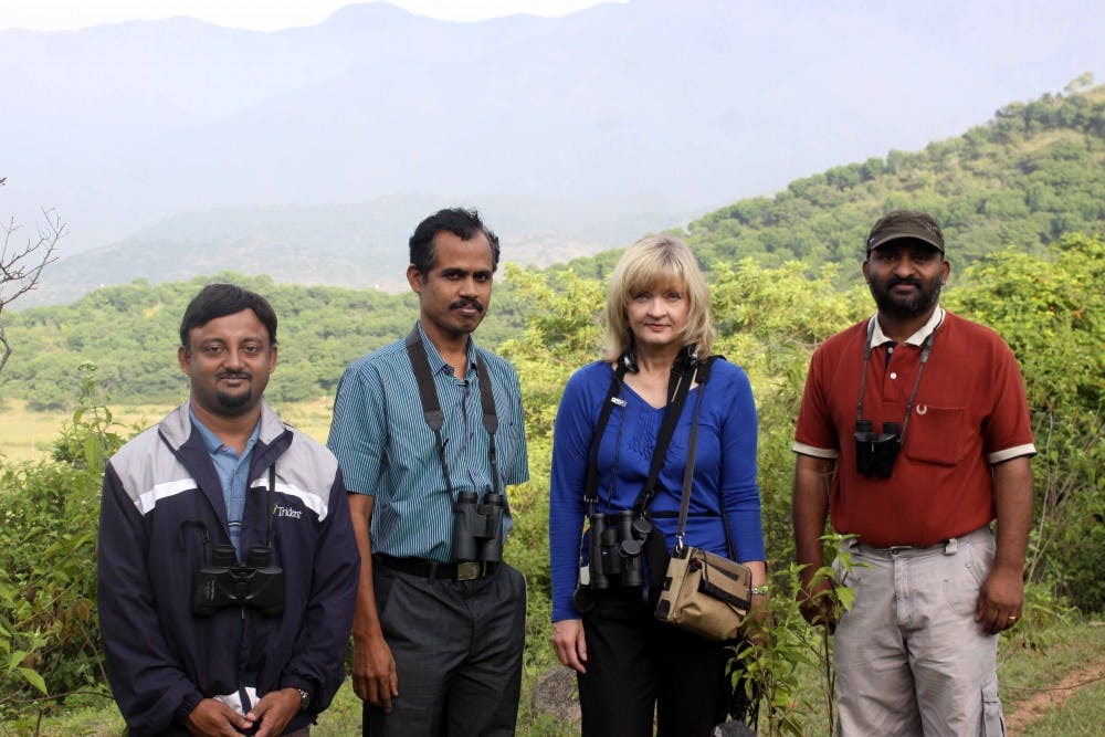 From left to right, an editor of the journal Indian Birds Praveen J, head of public education at Salim Ali Centre for Ornithology in Coimbatore Pramod Nair, Pamela Rasmussen, and CK Vishnudas pose for a picture near Coimbatore, India. Photo Courtesy Pamela Rasmussen