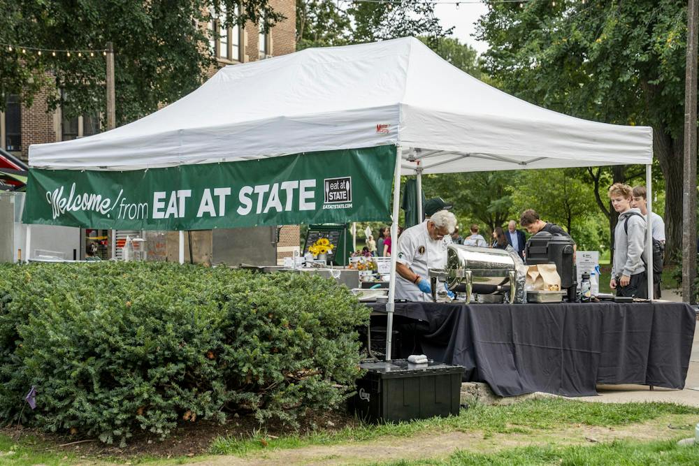 <p>MSU Culinary Services Executive Sous Chef Rajeev Patgaonkar prepares food for customers in the MSU Union courtyard in East Lansing, Mich., on Wednesday, Sept. 16, 2026.</p>