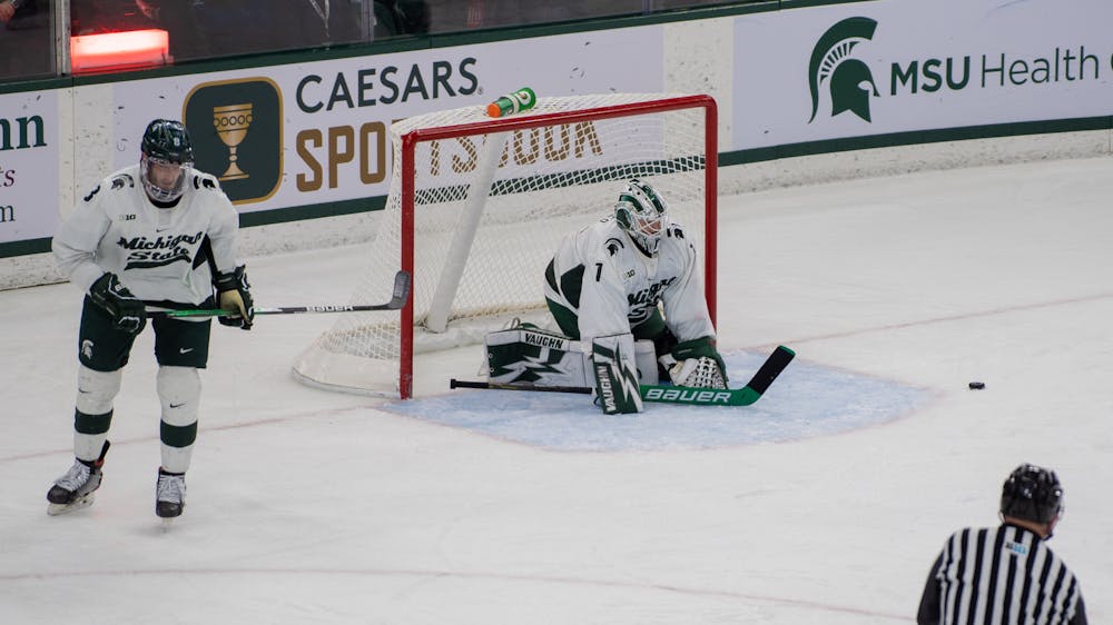 <p>Senior goaltender Drew DeRidder (1) kneels down after an Ohio State goal in the second period. The Spartans fell to the Buckeyes, 4-1, at Munn Ice Arena on Jan. 21, 2022. </p>