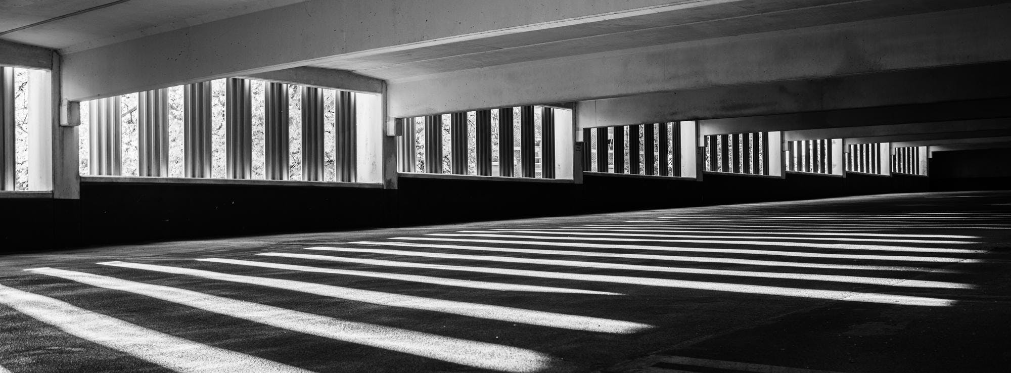 Light spills into Parking Ramp #2 on Auditorium Road on Michigan State University's campus in East Lansing, Michigan on May 26, 2025. 