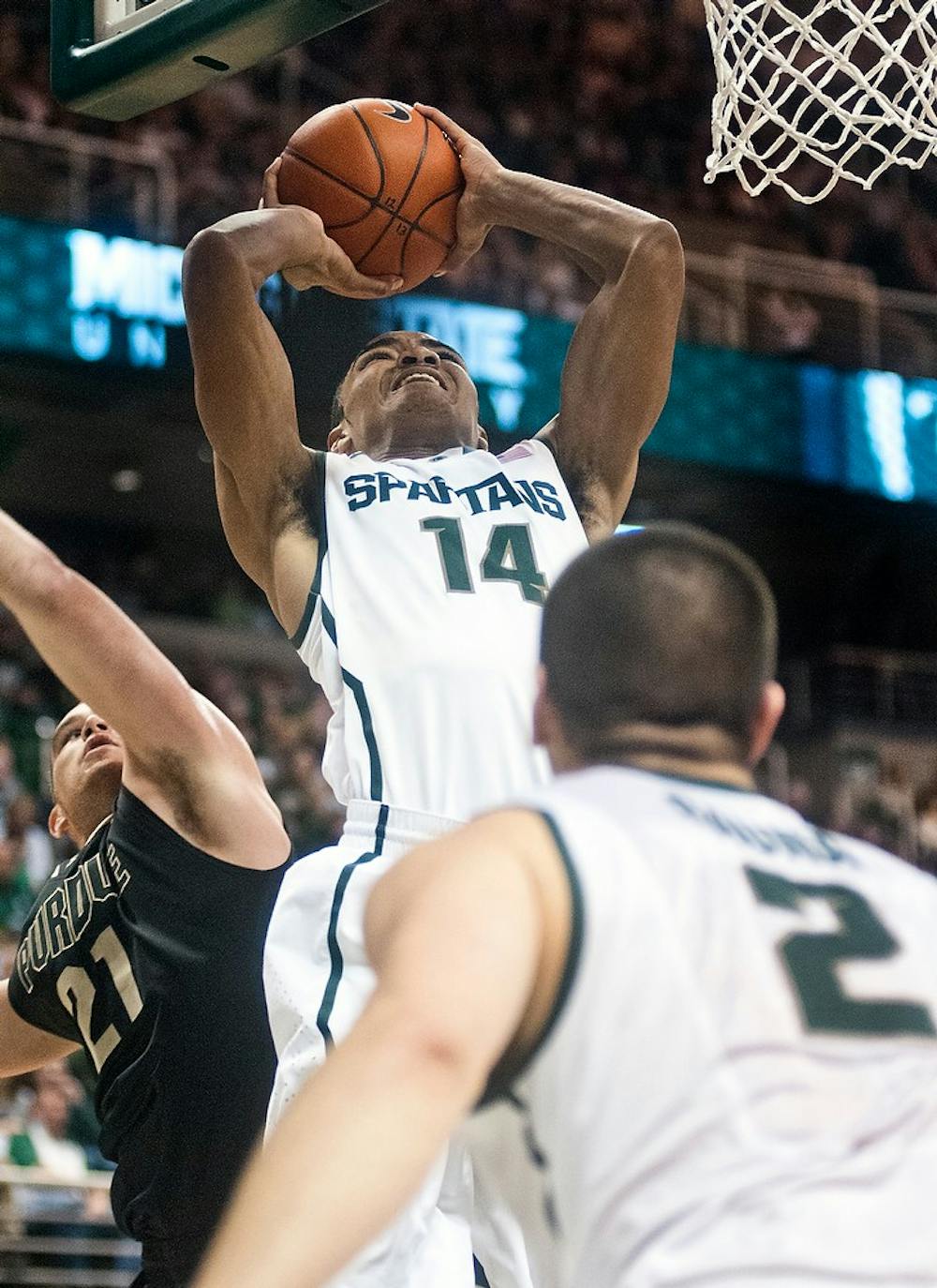 	<p>Freshman guard Gary Harris takes a shot under the basket Saturday, Jan. 5, 2012, at Breslin Center. Harris recorded 22 points during <span class="caps">MSU</span>&#8217;s 84-61 victory over Purdue. Adam Toolin/The State News</p>