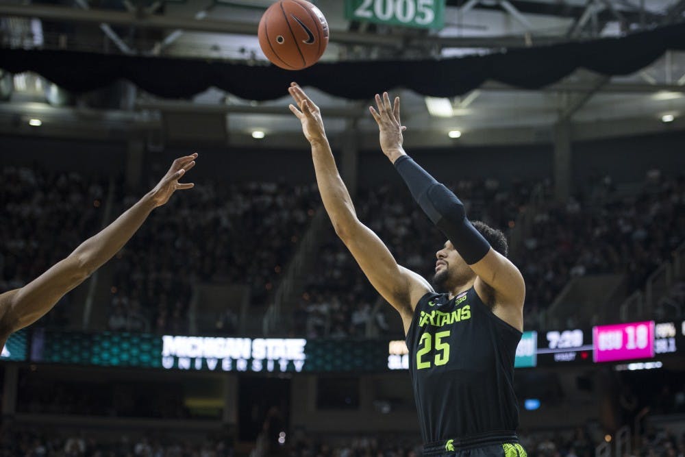 <p>Senior forward Kenny Goins (25) shoots the ball during the men&#x27;s basketball game against Ohio State at Breslin Center on Feb. 17, 2019. </p>