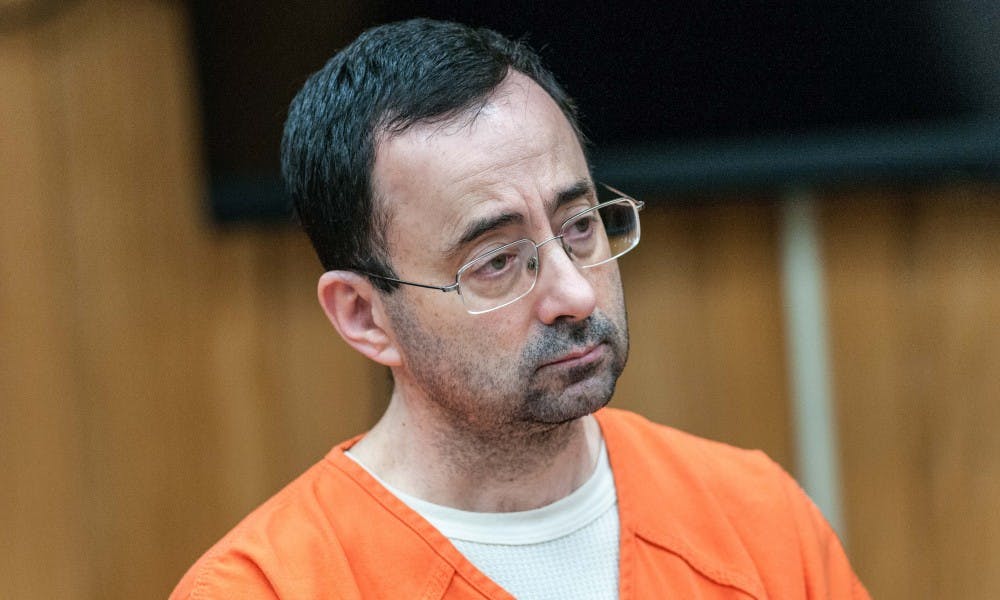 Larry Nassar listens to the judge during the plea hearing on Nov. 29, 2017, at the Eaton County Friend of Court. Nassar pleaded guilty to three counts.