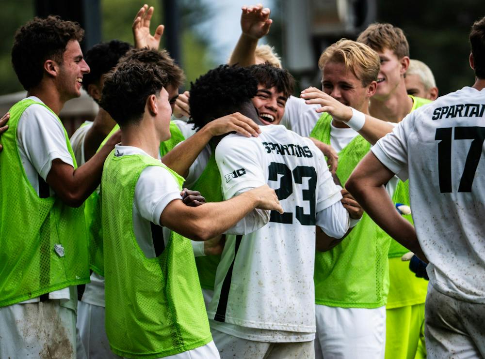 <p>MSU senior midfielder, Leo Conneh (23) is surrounded by his team in celebration of a goal at DeMartin Stadium in East Lansing, Mich., on Sunday, Aug 30, 2026.</p>