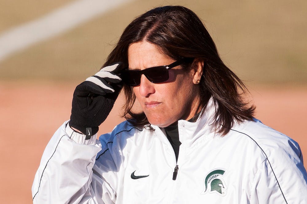 	<p>Head coach Jacquie Joseph adjusts her sunglasses April 3, 2013, at Secchia Stadium at Old College Field. The Spartans defeated the Nittany Lions in the second game of the doubleheader, 7-1. Justin Wan/The State News</p>