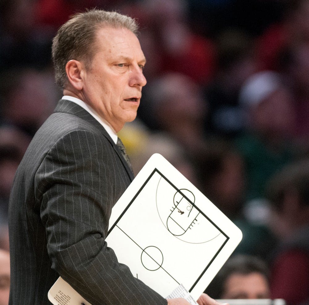 	<p>Men&#8217;s basketball head coach Tom Izzo holds his clipboard and paces along the sidelines during the semifinal round of the Big Ten Tournament against Ohio State on March 16, 2013, at United Center in Chicago, Ill. The Buckeyes beat the Spartans, 61-58. Natalie Kolb/The State News</p>
