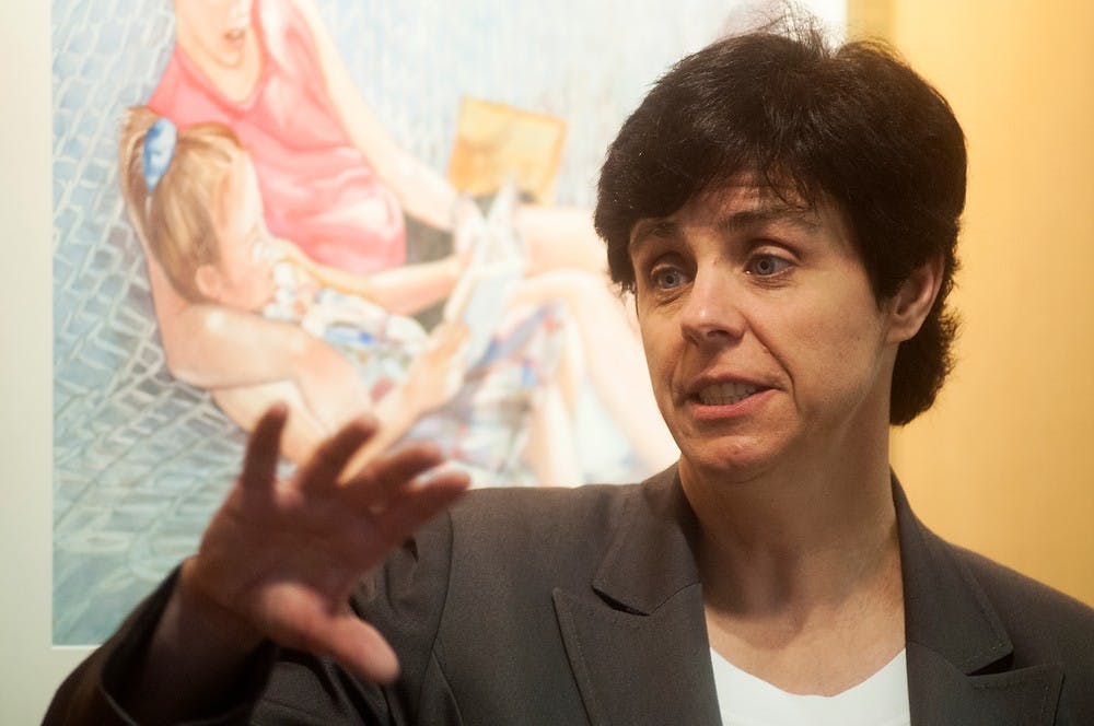 Ruth Beier announces her candidacy for city council April, 18, 2013, at the East Lansing Public Library, 950 Abbot Road. She will be running for an open council position in November against Kevin Beard and Kathleen Boyle. Julia Nagy/The State News