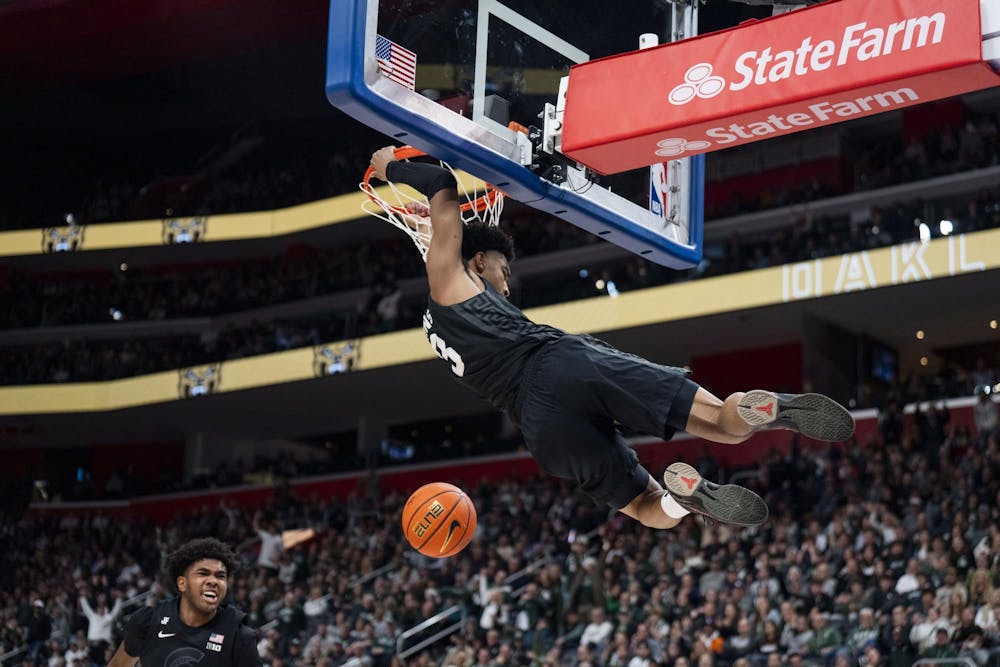 <p>Michigan State senior guard ​​Jaden Akins (3) dunks the ball at Little Caesars Arena on Dec. 17, 2024. The Spartans defeated the Golden Grizzlies 77-58.</p>