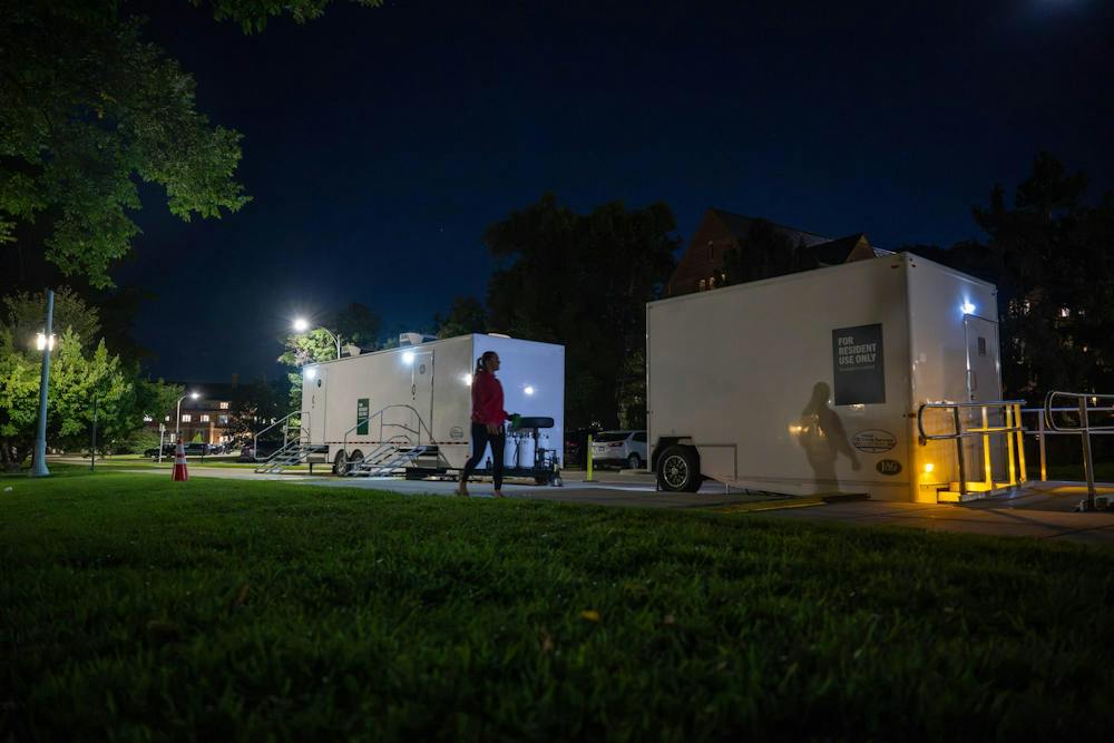 <p>Mobile shower units are brought on campus following a campuswide power outage at Michigan State University on Delta Ct in East Lansing, Mich., on Wednesday, Sept. 23, 2026. MSU announced mobile showers would be available for students in West Circle as hot water and steam restoration continues across campus.</p>