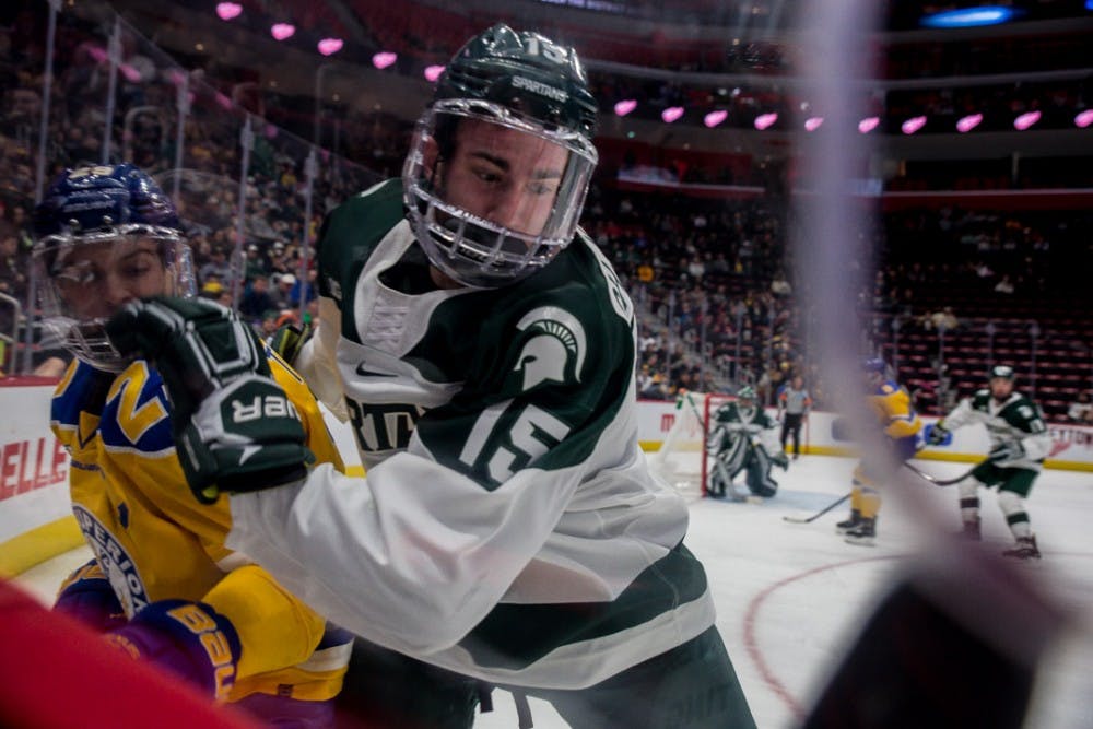 during the game against Lake Superior State on Dec. 30, 2018 at Little Caesar's Arena in Detroit. The Spartans fell to the Lakers, 4-3 in overtime.