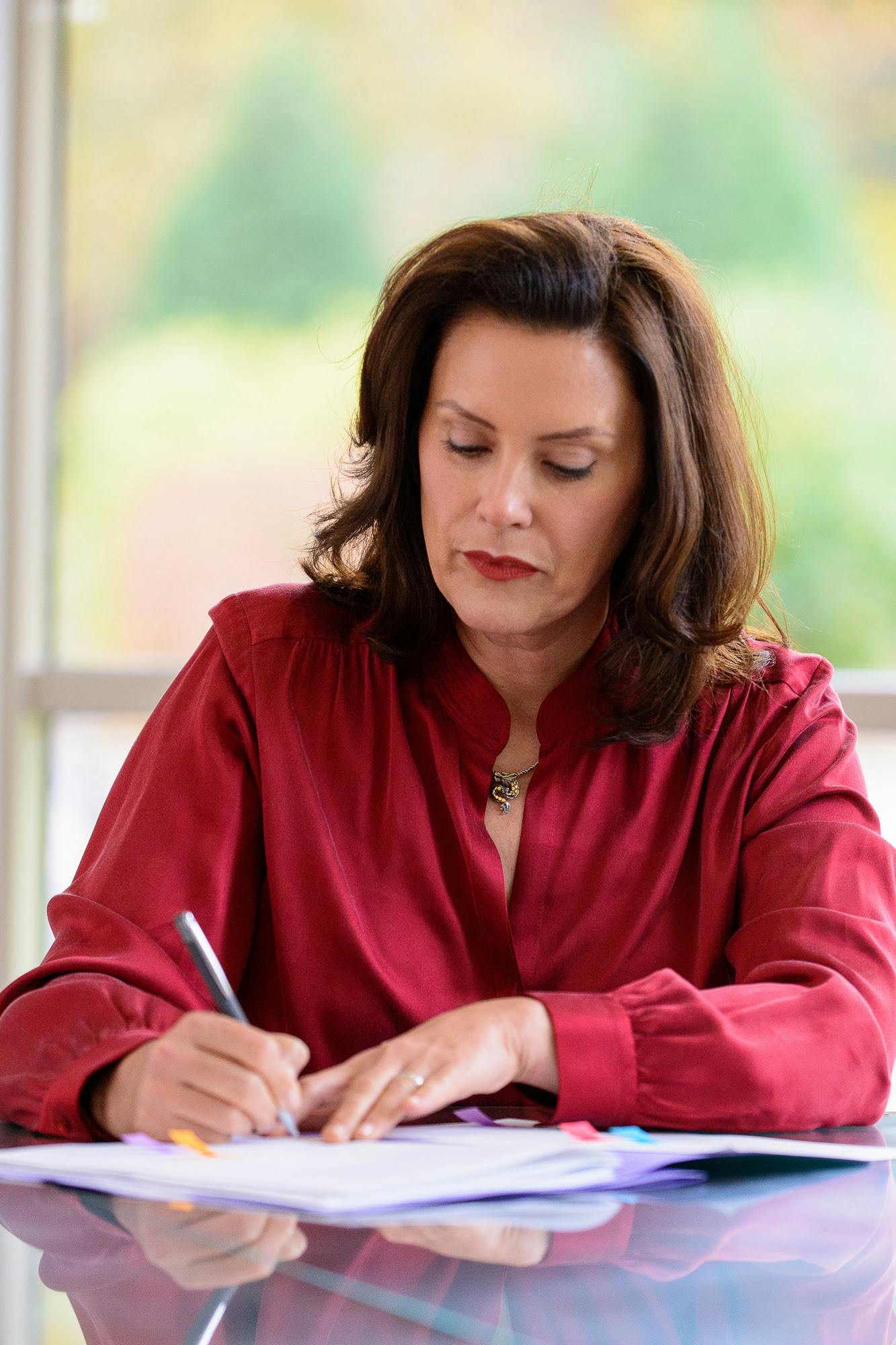 <p>Gov. Gretchen Whitmer signs bipartisan bills extending unemployment benefits to 26 weeks on Oct. 20, 2020. Courtesy photo provided by Michigan Executive Office of the Governor.</p>